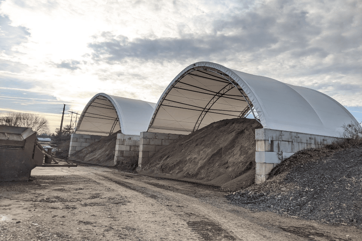 Large covered sand storage structures